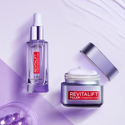 L&#039;Oréal Paris Revitalift Filler HA Deep Replumping And Restoring Volume Set cadou Cremă de zi pentru față Revitalift Filler HA 50 ml + ser pentru față Revitalift Filler HA Serum 30 ml + mască de ochi Revitalift Filler HA Cooling Eye Serum-Mask 1 buc