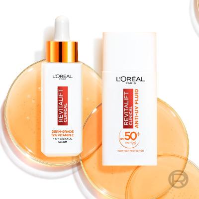 L&#039;Oréal Paris Revitalift Clinical Pure 12% Vitamin C Set cadou ser facial Revitalift Clinical Vitamin C Serum 30 ml + Cremă de zi pentru față Revitalift Clinical Vitamin C Anti-UV Fluid SPF50 50 ml