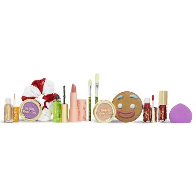 Makeup Revolution London Shrek Gingy 12 Days Advent Calendar Set cadou Fard de pleoape 2 buc + iluminator 1 buc + luciu de buze 2 buc + ruj de buze 1 buc + fard de obraz 1 buc + gel de sprâncene 1 buc + perie 2 buc + burete de machiaj 1 buc + oglindă 1 buc + elastic de păr 1 buc