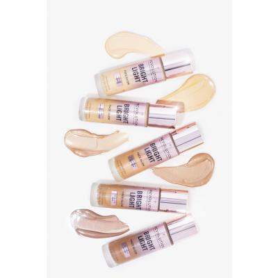 Makeup Revolution London Bright Light Face Glow Fond de ten pentru femei 23 ml Nuanţă Lustre Medium Light