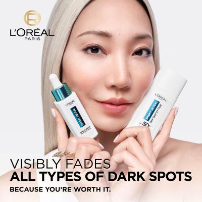 L&#039;Oréal Paris Bright Reveal Dark Spot UV Fluid SPF50+ Set cadou Crema  de zi Bright Reveal Dark Spot UV Fluid SPF50 50 ml + ser pentru fata Bright Reveal Niacinamide Dark Spot Serum 30 ml